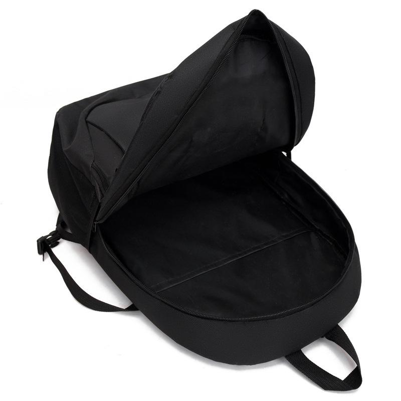 The new backpack is simple for men, junior high school and primary school students, large-capacity schoolbag, lightweight weight travel backpack.