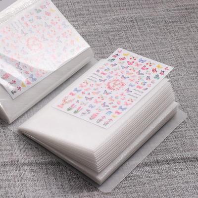 Velkokapacitní album pro ukládání samolepek a nail art s 80 průhlednými kapsami pro snadnou organizaci a prezentaci