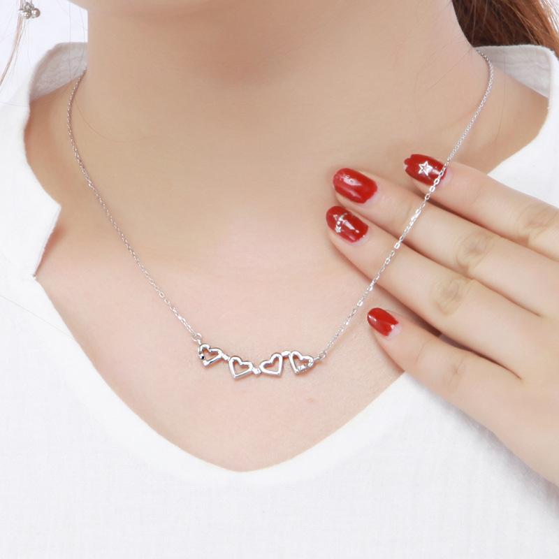 A Woman Wearing Four-leaf Clover Necklace, Lucky Four-leaf Clover Pendant, Collarbone Chain, Sweater Chain, Neck Chain