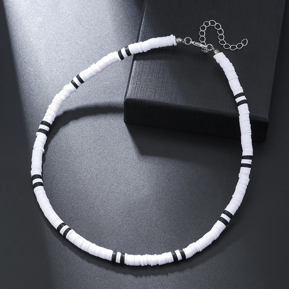 

Мужское ожерелье в стиле бохо из мягкой глины и дерева, черное и белое