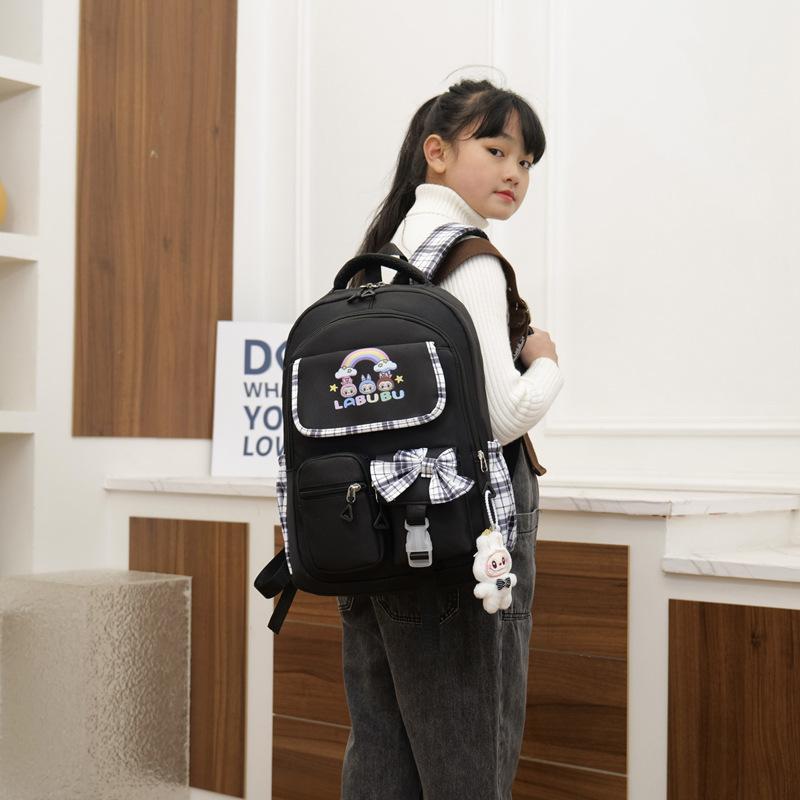 Schoolbag1011 new schoolbag for primary school students in grades 1 to 6 to reduce the burden of non-slip shoulder pads, male and female schoolbags