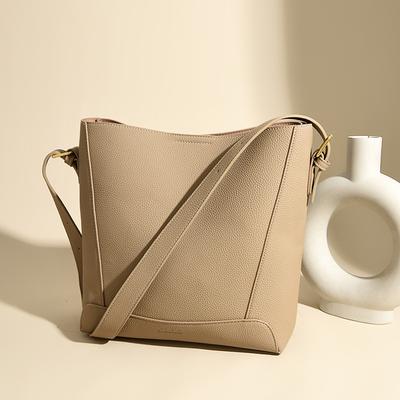 Eimertasche Eine modische Pendlerhandtasche mit großem Fassungsvermögen Eine Schulter-Umhängetasche