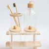 4-Piece Bathroom Set: Transparent Press-Down Soap Bottle, Toothbrush Holder, Bamboo Lid Cotton Swab Box, and Acrylic Cotton Ball Jar