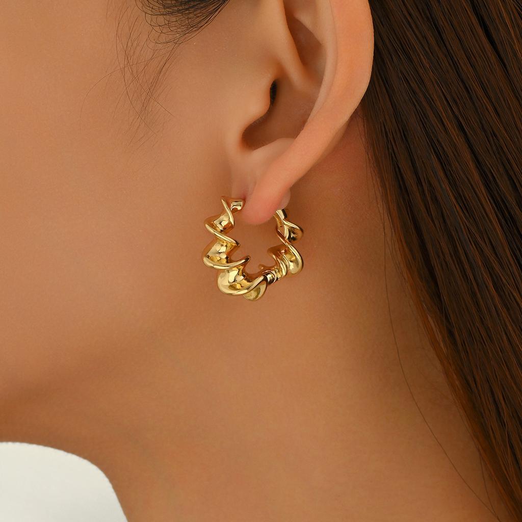 Popular geometric women's jewelry niche twisted design earrings high-end light luxury earrings versatile women