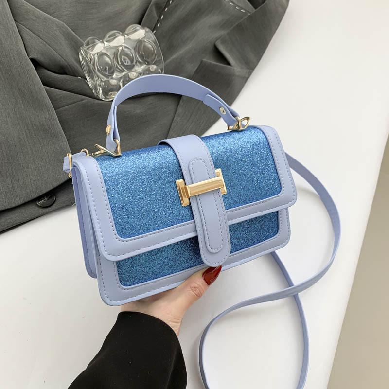 

This year s popular small bag women s summer 2025 new textured messenger bag contrasting color temperament women s portable small square bag синий