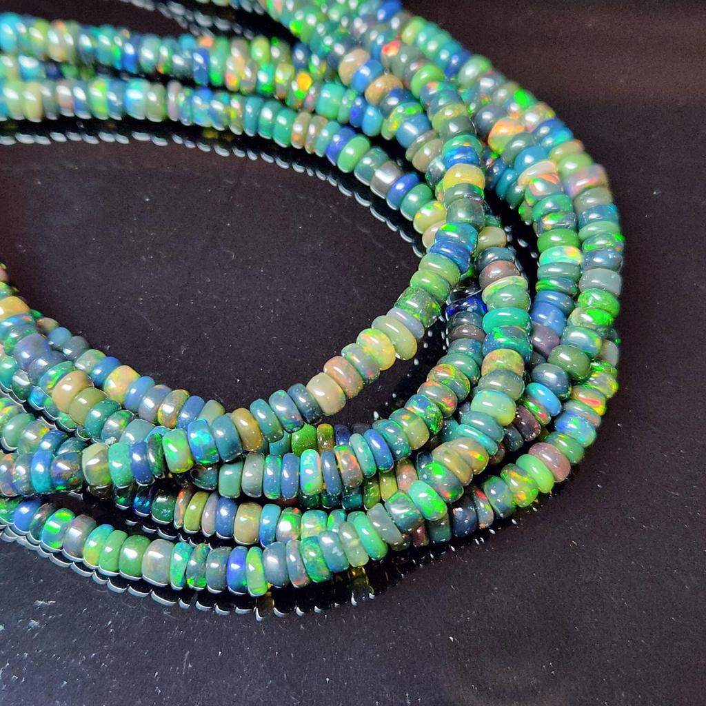 Smooth Polish Rainbow Flashy Rondell Ethiopian Opal Beads, Black Opal strand beads.