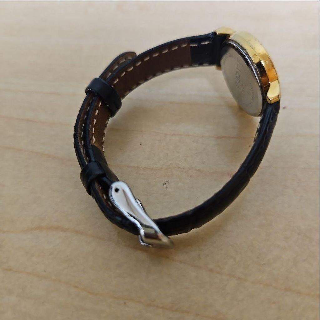 Used TISSOT watch gold leather