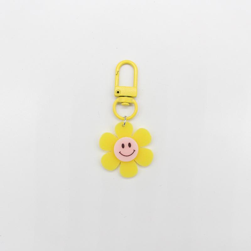 Breloc Floarea Soarelui Colorată cu Față Zâmbitoare – Farmec Proaspăt și Drăguț pentru Geantă