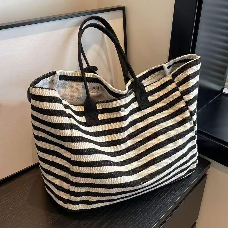 

Commuter canvas bag women s large-capacity tote bag bag new striped shoulder mommy tote bag