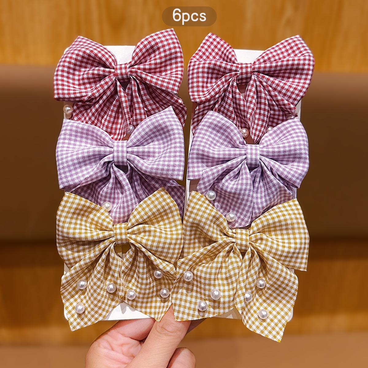 

6 Korean style fashionable bow hair clips for daily use as hair accessories Size fits all