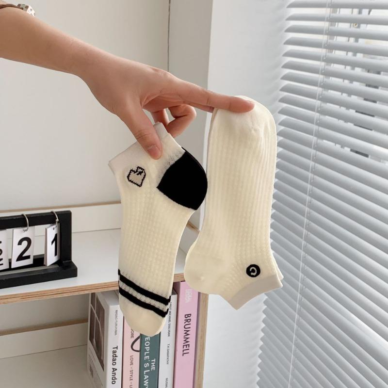 A Woman Wearing Summer Mesh Black and White Simple Embroidered Lettering Ultra-thin and Breathable Short Socks