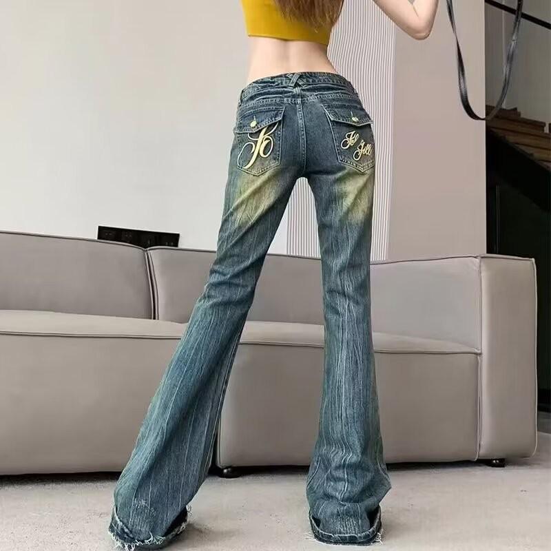 Women’s 2024 Retro Embroidered Bell-Bottom Jeans with Raw Edge Horseshoe Design for Spring and Autumn.