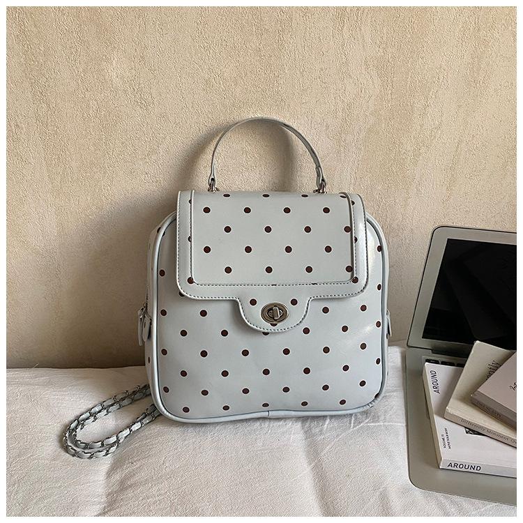 Schoolbag1011 Korean fashion portable Boston bag new niche design simple shoulder women's bag polka dot messenger bag