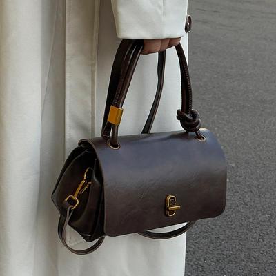 Un Bolso de Mano de Cuero Aceite-Cera de Moda de Nicho y Un Bolso Cruzado Casual de Cuero Suave de Hombro Único