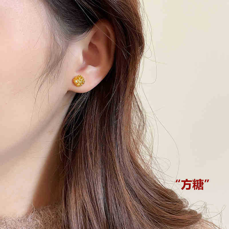 Gold brushed hollow sugar cube love stud earrings women s new popular temperament atmospheric earrings