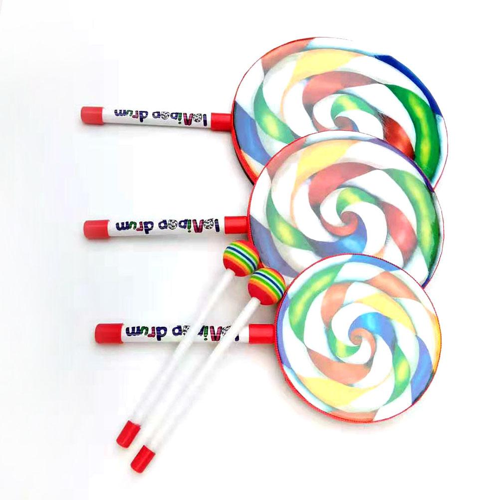 Roztomilý bubínek ve tvaru lízátka s paličkou v barvách duhy Hudební rytmické nástroje Děti Miminko Děti