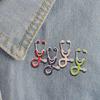 Minimalist Geometric Stethoscope Brooch: Colorful Alloy Pin with Silver Oil Drop Badge