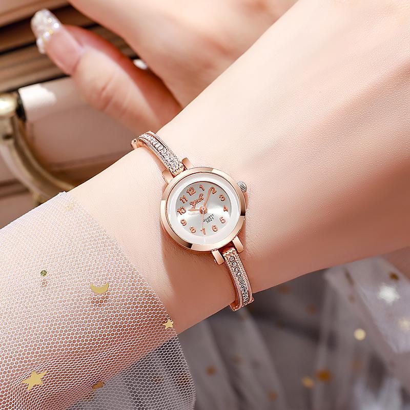 Women's high appearance level vivid exquisite Arabic numerals dial small dial steel band quartz watch.