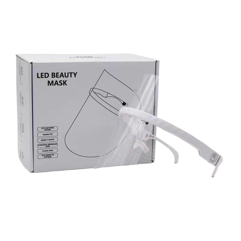 

Бытовой фототерапевтический лицевой спектрометр Лицевая трехцветная маска Косметологический прибор Фотонная маска Прибор Tongyan LED для омоложения кожи English белый