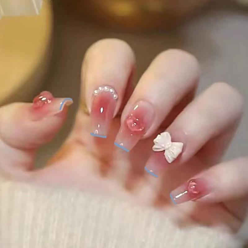 

Medium Blush Press-On Nails: Sexy Gradient Heart Design with Bow Accents In-Stock
