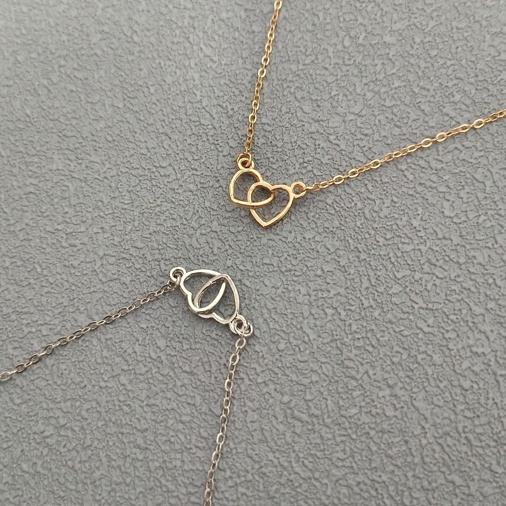 Interlocking Hearts High-End Women's Bracelet - Creative, Simple, Hollow Heart Design