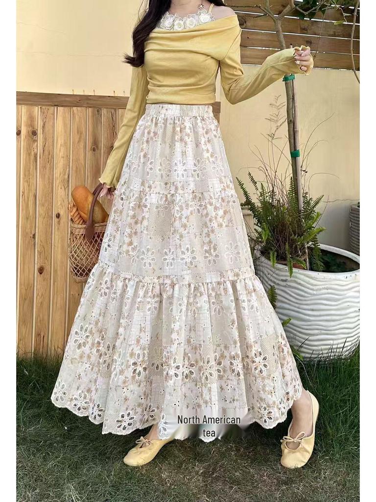 High-Waisted Floral Midi Skirt: Slimming, Hip-Covering, Flare A-Line Design for an Elegant, Youthful Look.