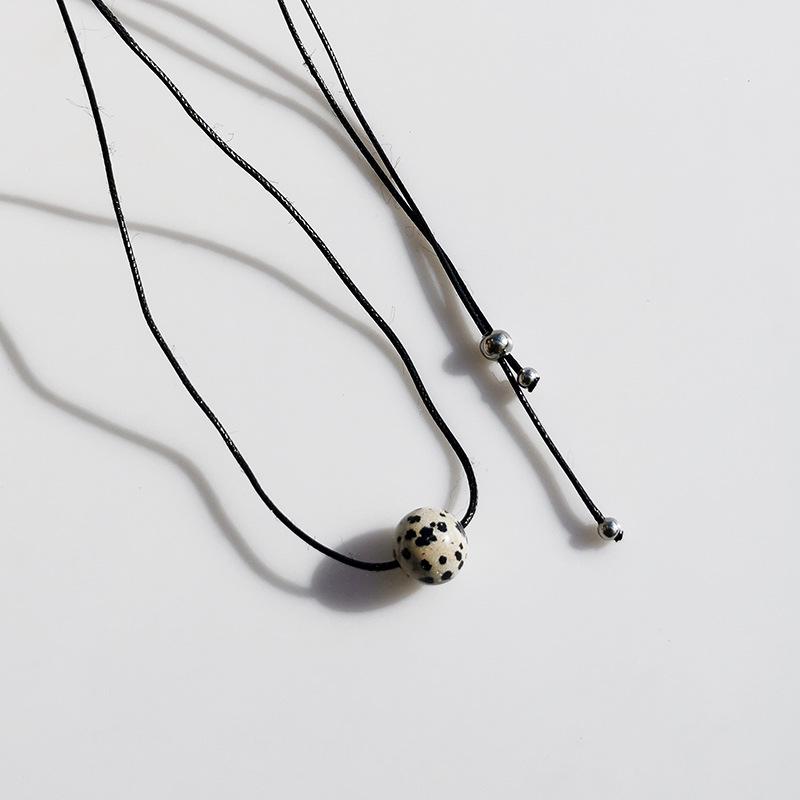 Unisex Retro Geometric Stone Pendant Necklace with Rotating Bead & Leather Cord – Versatile, High-End, Colorfast Design for Women & Men