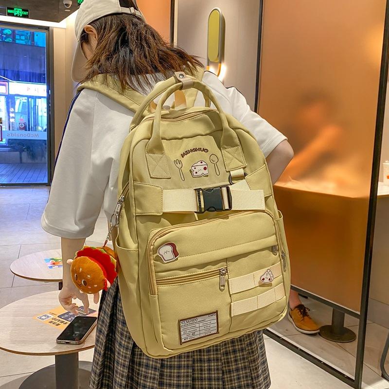 Sweet wind small fresh drawstring lock double pocket student schoolbag junior high school student large capacity backpack