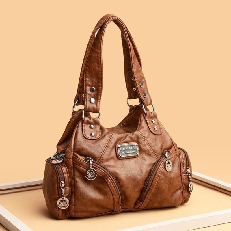 

Retro soft leather locomotive bag new European and American tide oblique span shoulder bag quality women s bags коричневий