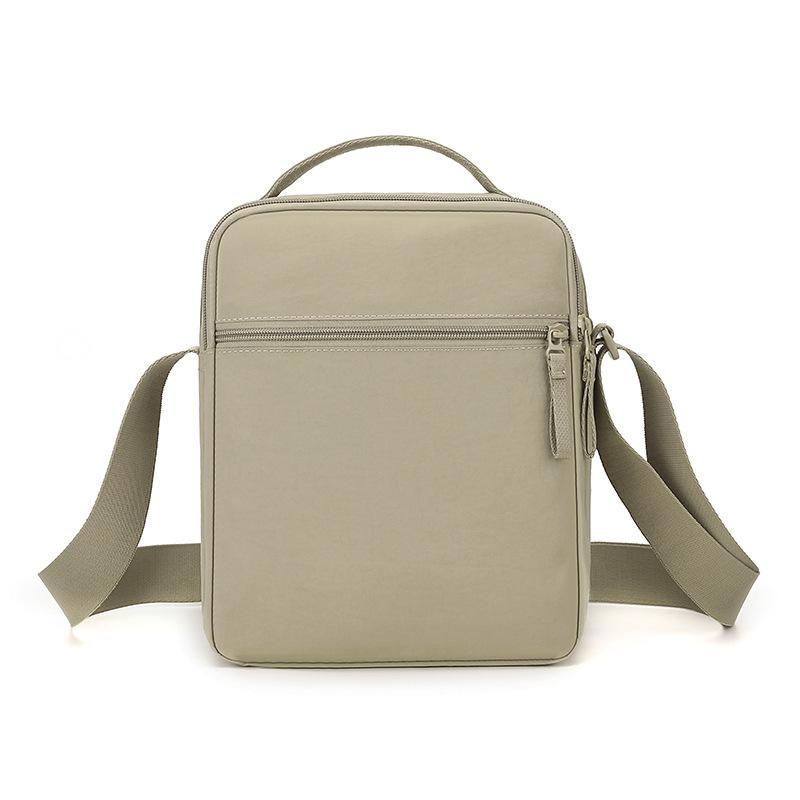 Nylonová crossbody taška s horním uchem a přední kapsou na zip pro muže i ženy pro každodenní použití