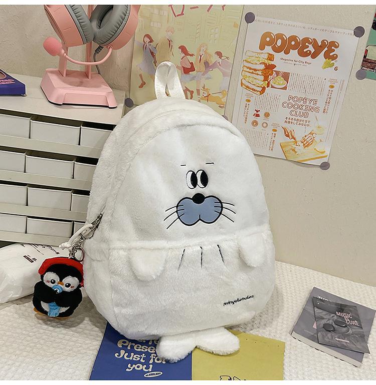 Schoolbag plush cartoon schoolbag female cute girl cute little seal backpack female student soft cute furry animal backpack autumn and winter