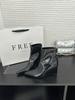 Autumn and winter French temperament pointed head simple wedge heel short boots fashionable solid color rear zipper boots women