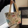 Canvas bag women's large-capacity portable shoulder handbag niche design work commuting tote bag