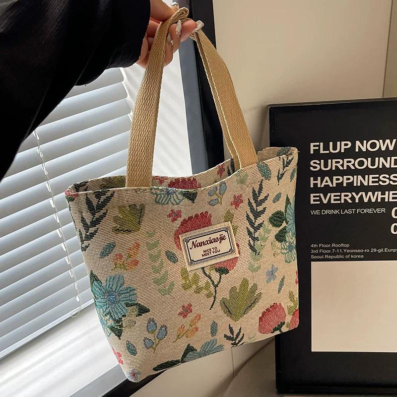 Canvas bag women's large-capacity portable shoulder handbag niche design work commuting tote bag