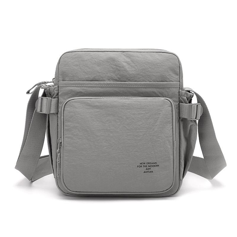 Lehká nylonová crossbody taška pro muže i ženy, neformální taška přes rameno typu messenger se zipovými kapsami