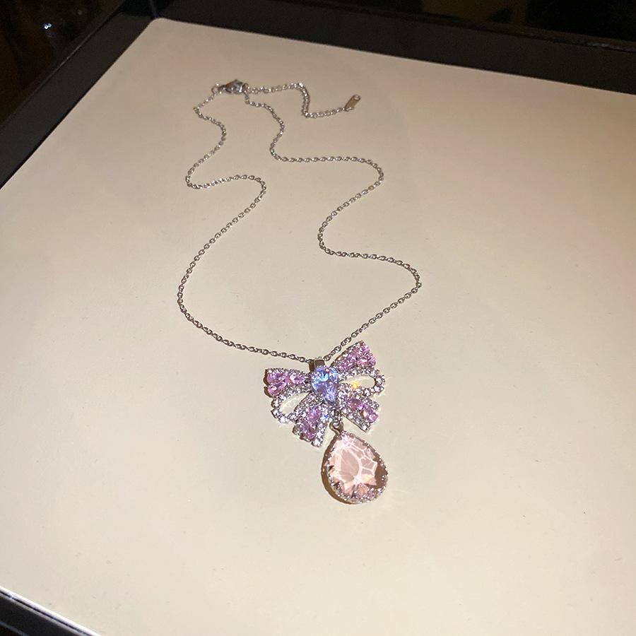 

Zircon butterfly water drop fringed ear hook light luxury high-end temperament earrings cross-border explosion earrings design sense niche