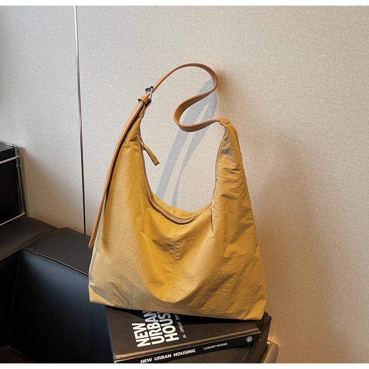 

Large-capacity tote bag women s new versatile casual simple shoulder bag high-end sense niche commuter messenger bag хаки