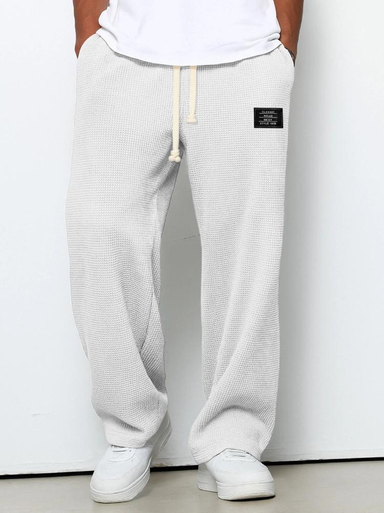 Pantaloni della tuta casual sportivi a gamba dritta in maglia waffle con elastico e coulisse a vita media