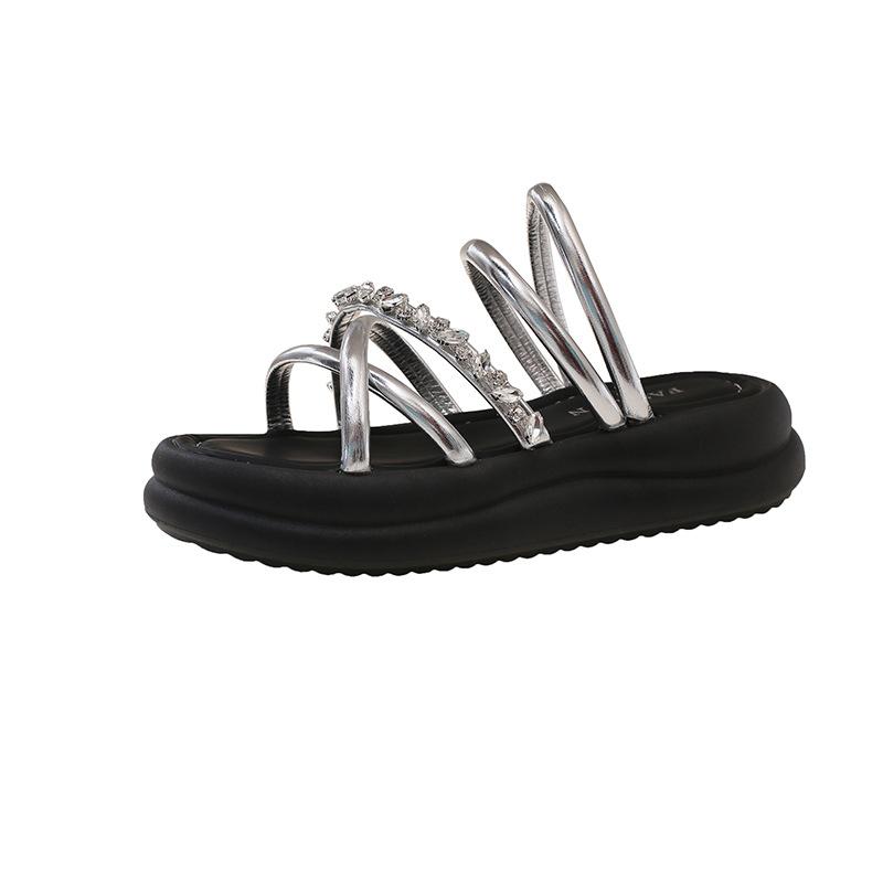 Stepping on shit soft leather slippers women's 2025 new summer wear one-word drag with skirt non-slip soft sole two wear sandals
