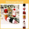 Playful Christmas Themed Wine Bottle Wraps Featuring Cozy Knitted Characters For Holiday Cheer