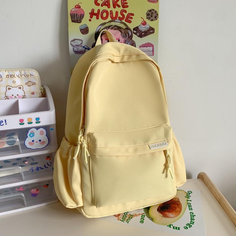 Schoolbag spring and summer new fashion candy color small fresh backpack waterproof and wear-resistant student schoolbag women's solid color casual