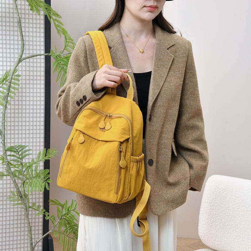 Compact Lightweight Backpack with Multiple Pockets and Front Flap Design for Daily Use and Travel