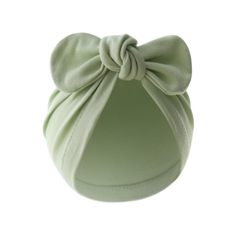 

Детская шапочка-бабочка с завязанным узлом