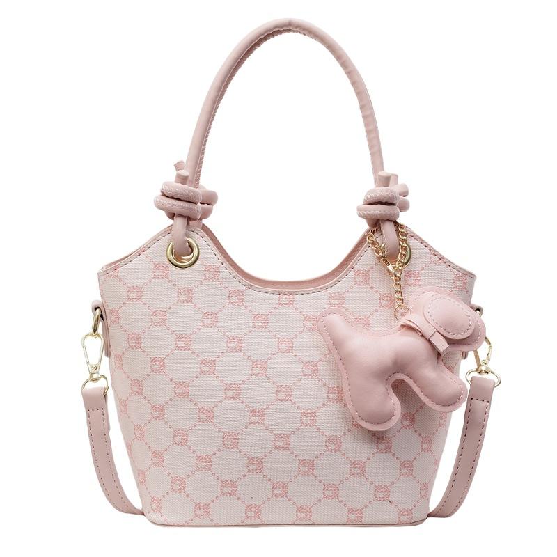 Korean version of trend, high-end printing temperament, portable bucket bag, niche fashion commuting versatile light luxury messenger bag, women