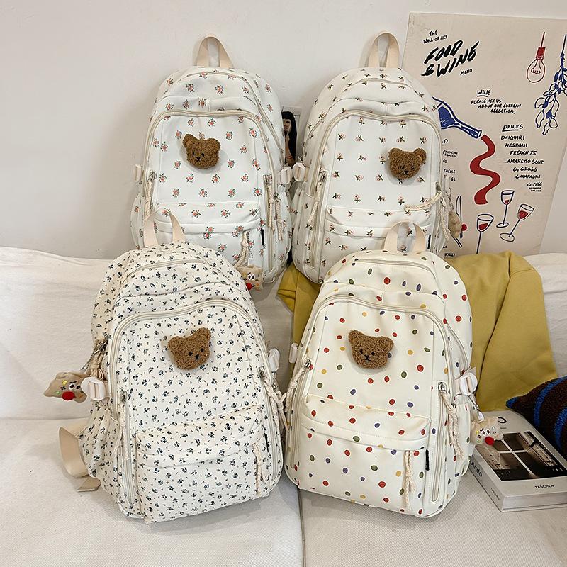 Small fresh schoolbag female college student cute small floral travel backpack lightweight large capacity junior high school student backpack