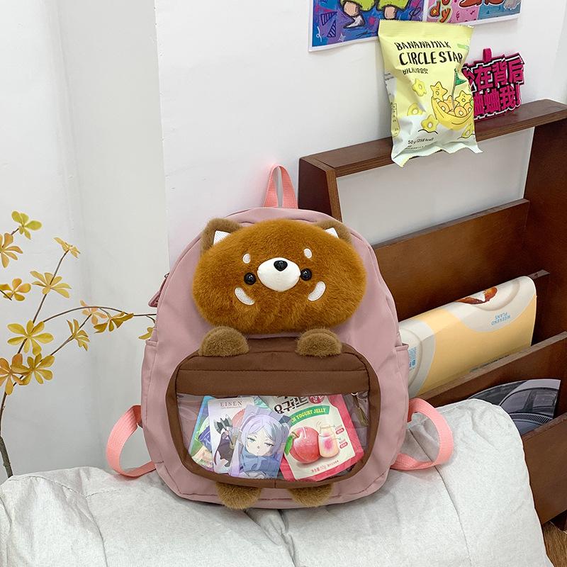 

Plush Little Raccoon Cartoon Backpack With Large Capacity For Use Students розовый