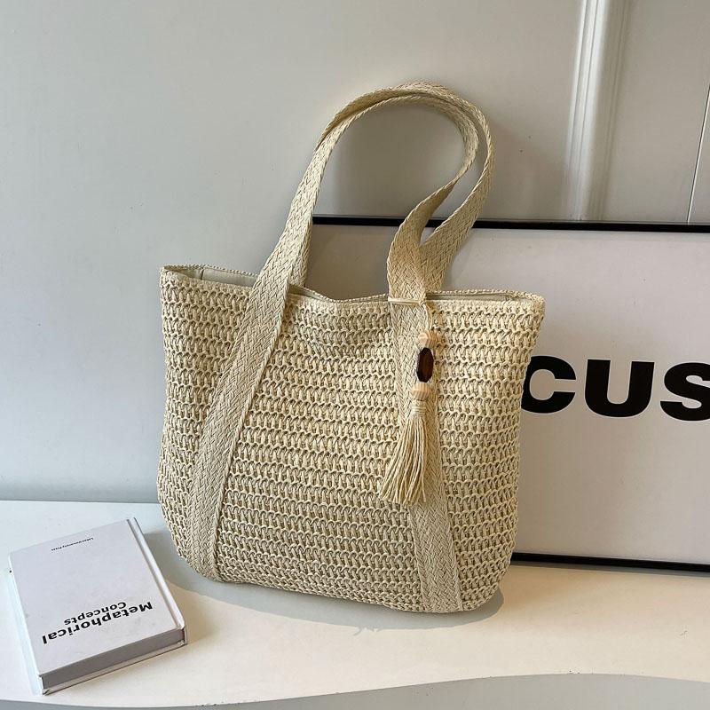 Handwoven Straw Tote Bag Women's Summer Beach Bag with Tassel Detail and Lightweight Design