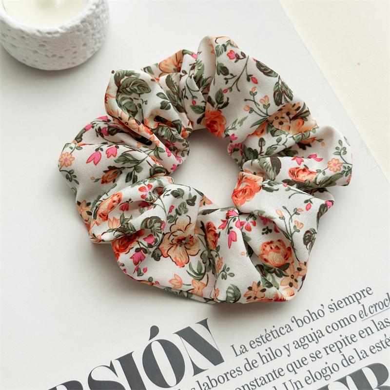 

New style chiffon large loop small floral light and fresh fabric ponytail hairband for women, versatile and suitable for all occasions. Floral print білий