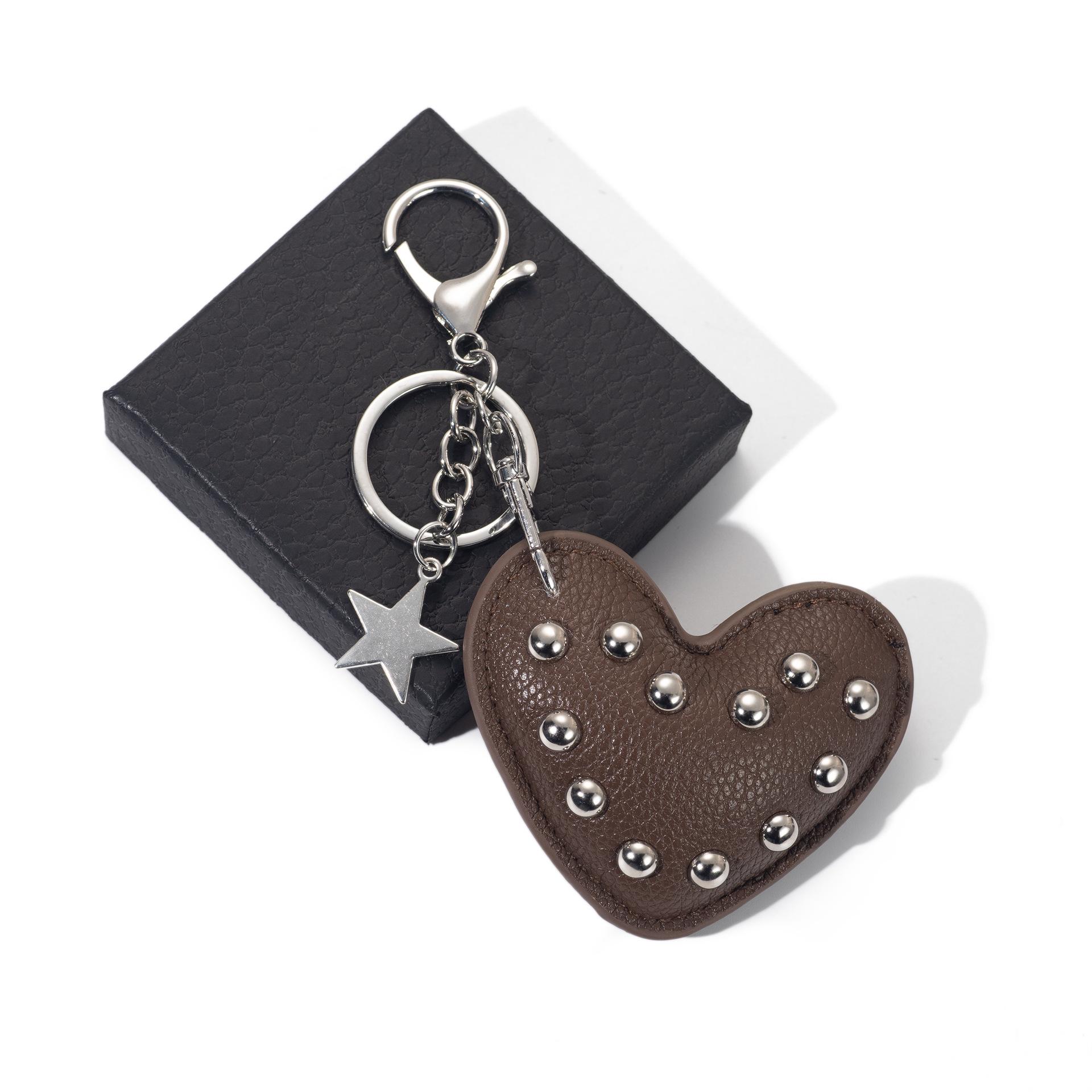 

Love Heart Leather Keychain with Rivet Design – High-End Accessory