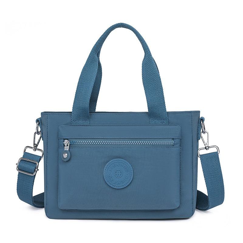 Nova moda de verão simples bolsa de ombro portátil de grande capacidade bolsa de pano bolsa mensageira casual leve